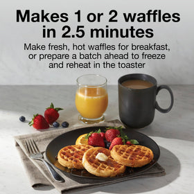 Proctor Silex waffle maker pouring batter for two waffles