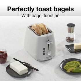 Proctor Silex 2-Slice Toaster defrost button helps thaw breads evenly before toasting.