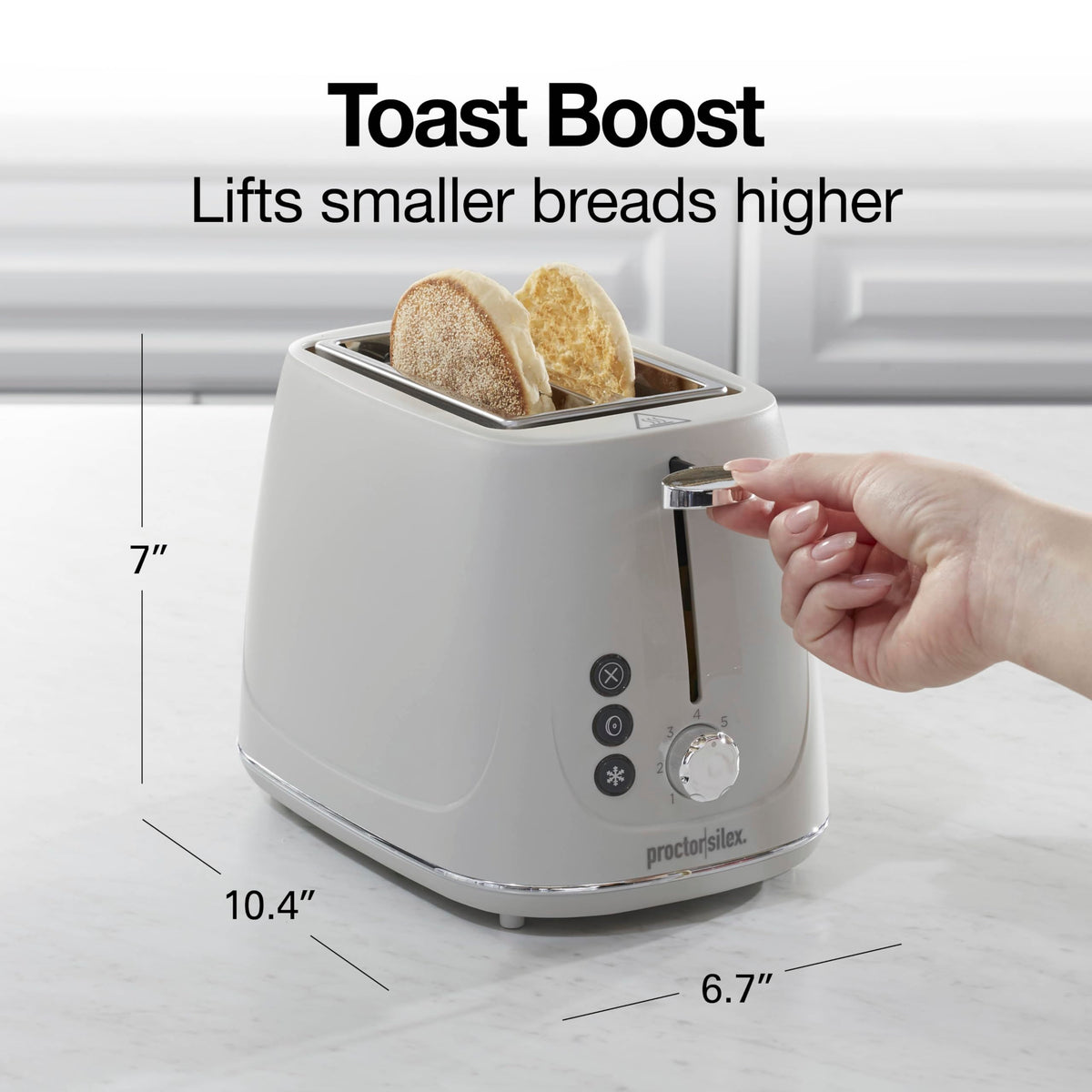 Proctor Silex toaster slide-out crumb tray simplifies cleanup after toasting.