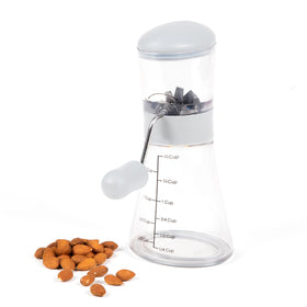 Progressive Nut Chopper with removable base to chop directly over food