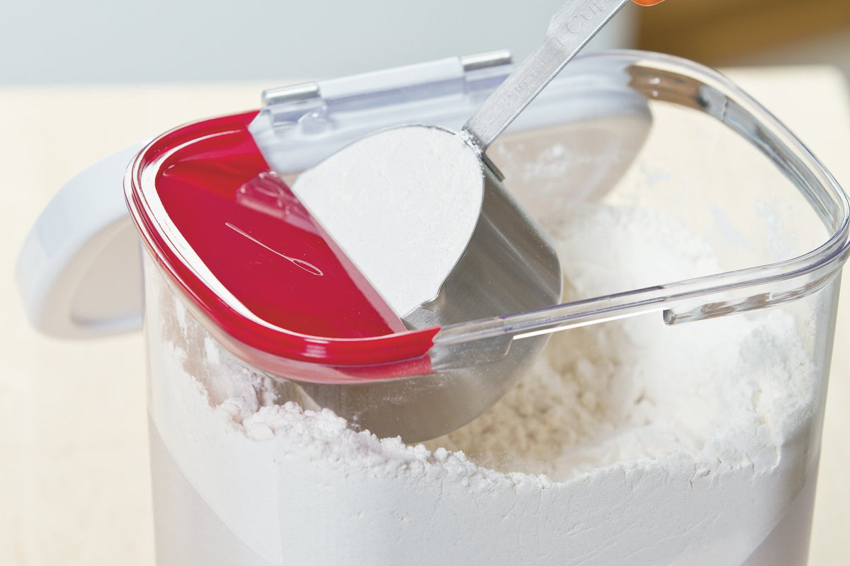 Progressive PrepSolutions Flour Keeper lid opened showing built-in leveler for precise scooping