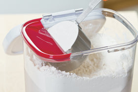 Progressive PrepSolutions Flour Keeper lid opened showing built-in leveler for precise scooping