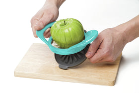 PrepWorks apple slicer with attached safety cover base protecting fingers