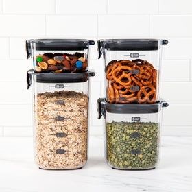Progressive ProKeeper+ stacked containers illustrating space-saving modular design.