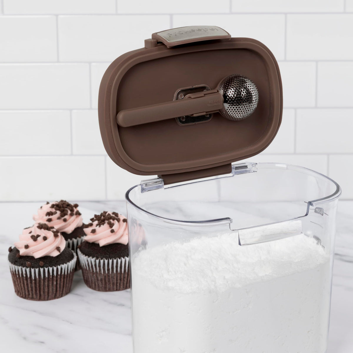 ProKeeper+ Magnetic dusting spoon stores under lid for easy access.