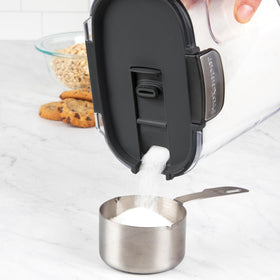 ProKeeper Magnetic Dusting Spoon stores under lid for quick cocoa dusting.