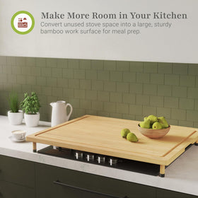 Prosumer's Choice bamboo stove top cover with juice groove catches spills for easier cleanup.