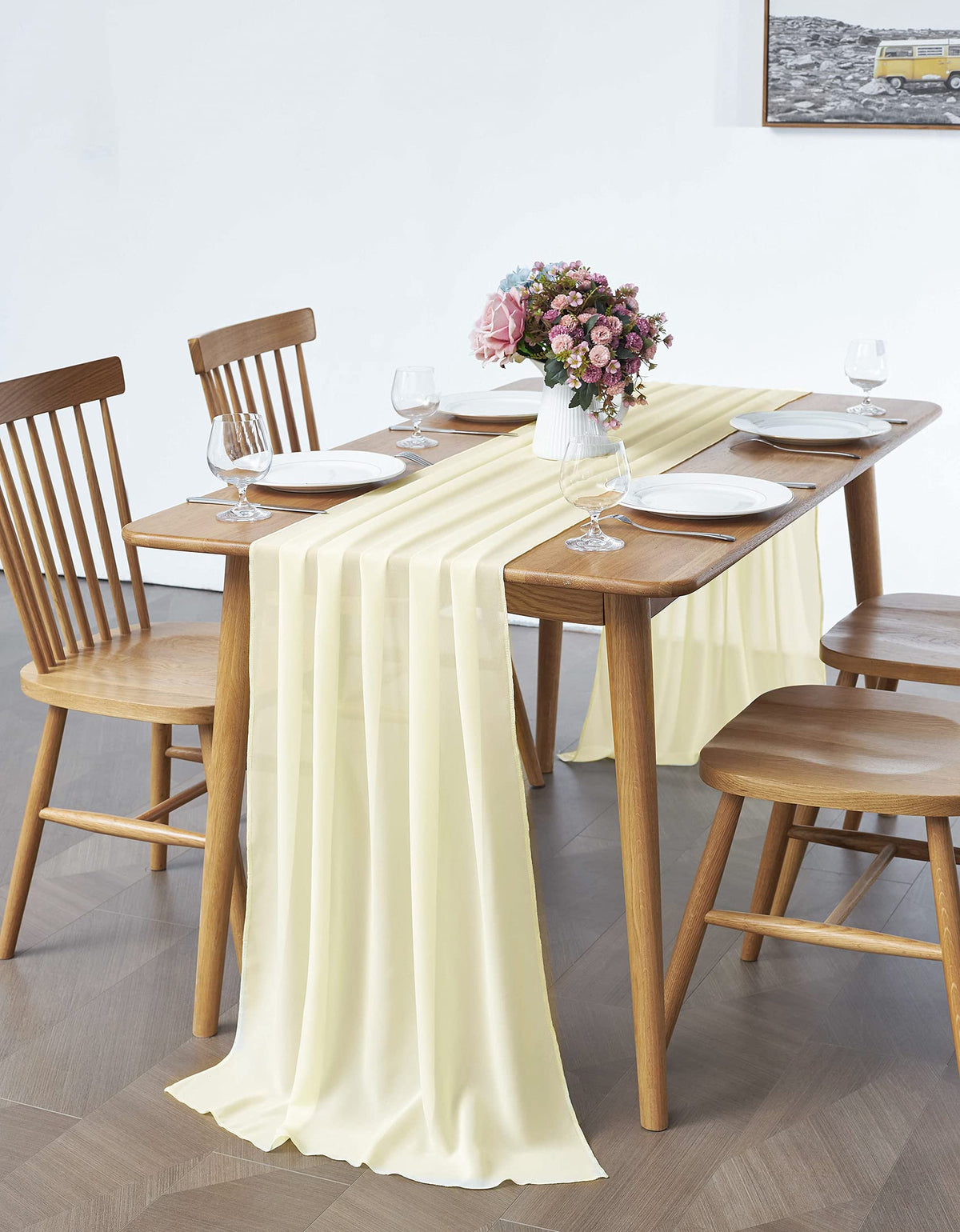 Pufogu baby shower table decor in soft yellow chiffon.