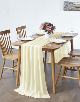Pufogu baby shower table decor in soft yellow chiffon.
