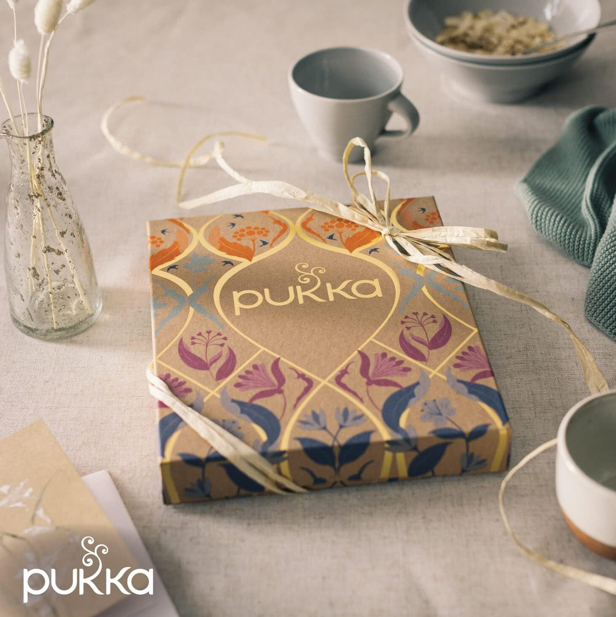 PUKKA tea cup with steam highlights relaxing evening ritual.