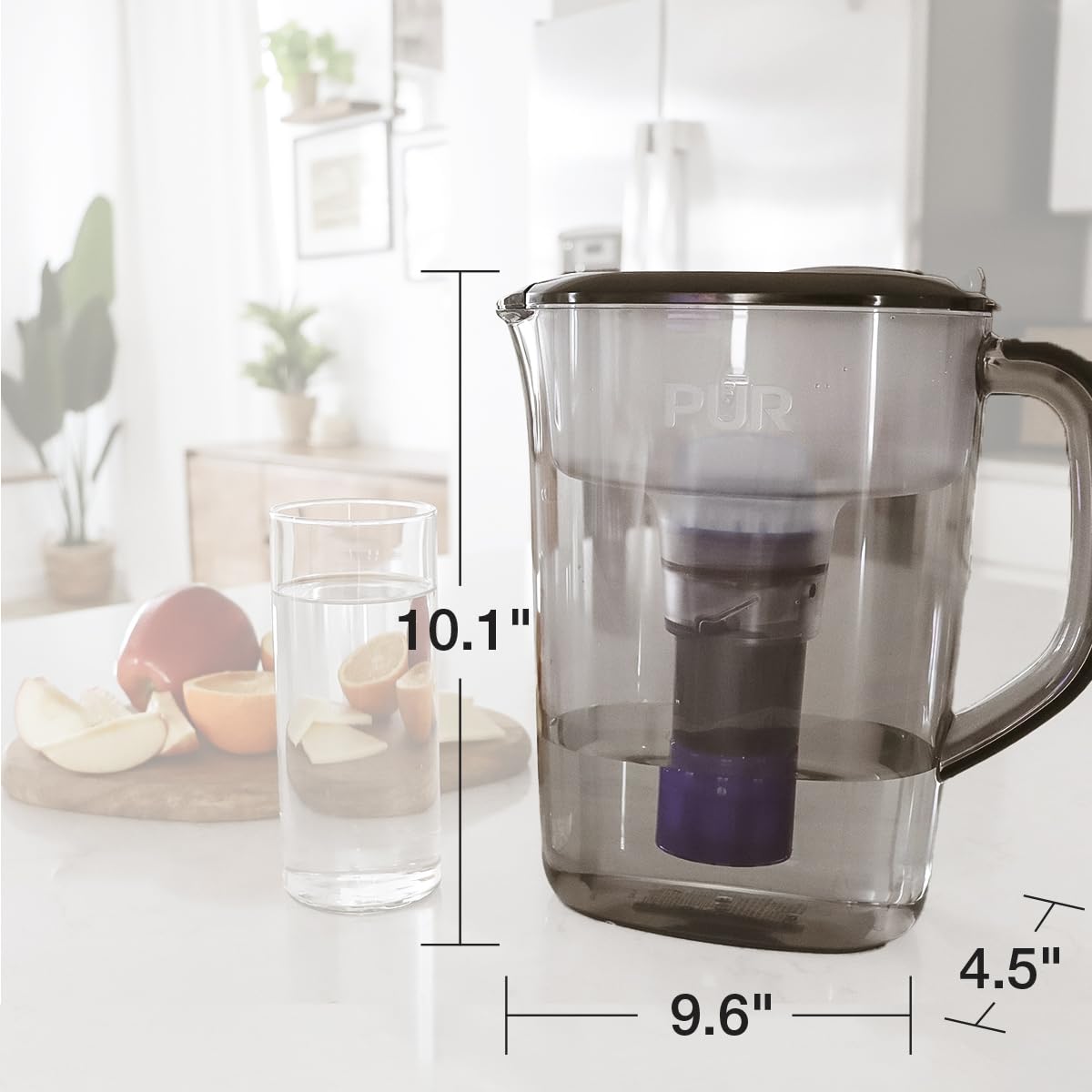 Eco-friendly use of PUR Plus pitcher highlights reduced plastic bottle consumption.