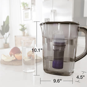 Eco-friendly use of PUR Plus pitcher highlights reduced plastic bottle consumption.