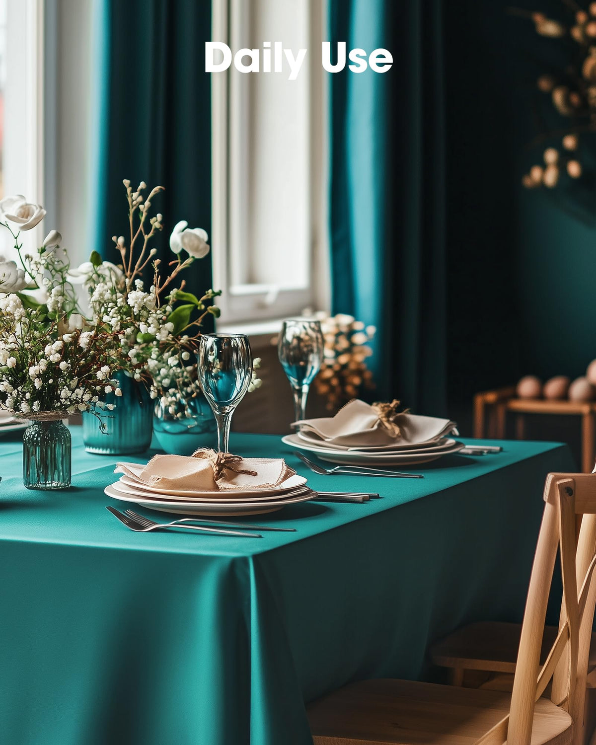 Pureegg teal disposable rectangle tablecloth on a dining table