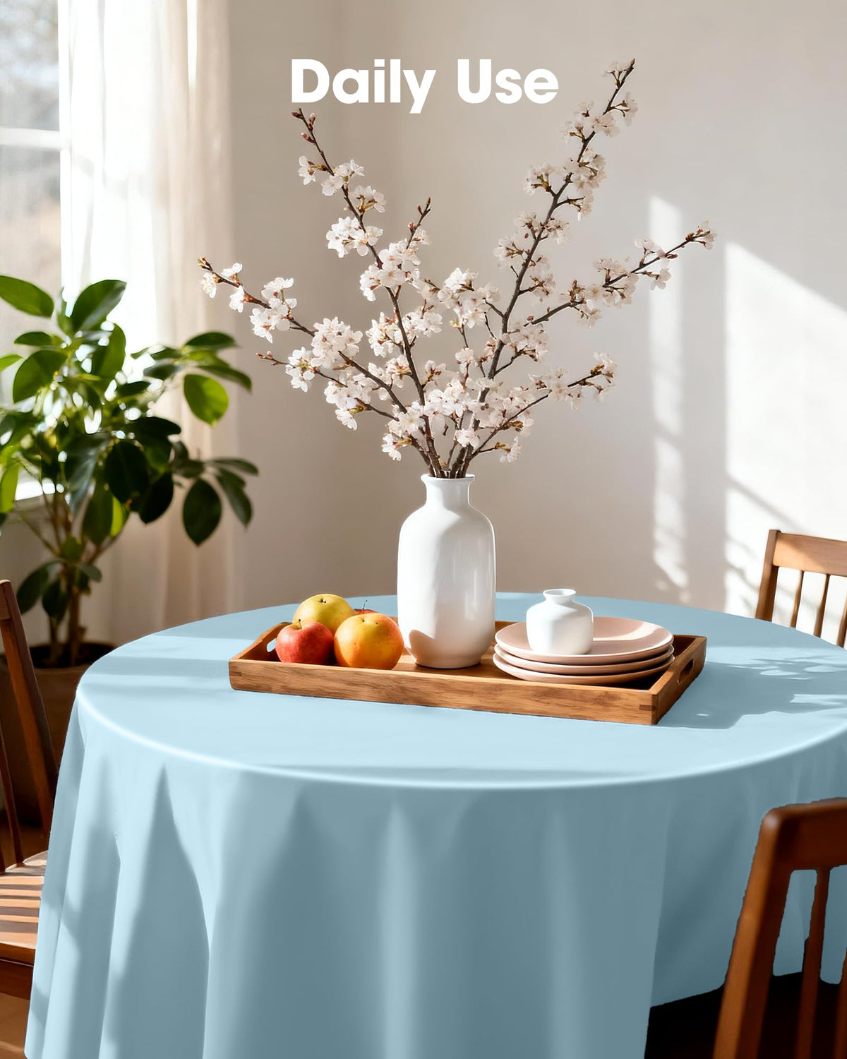 Pureegg light blue round tablecloth complements any decor.