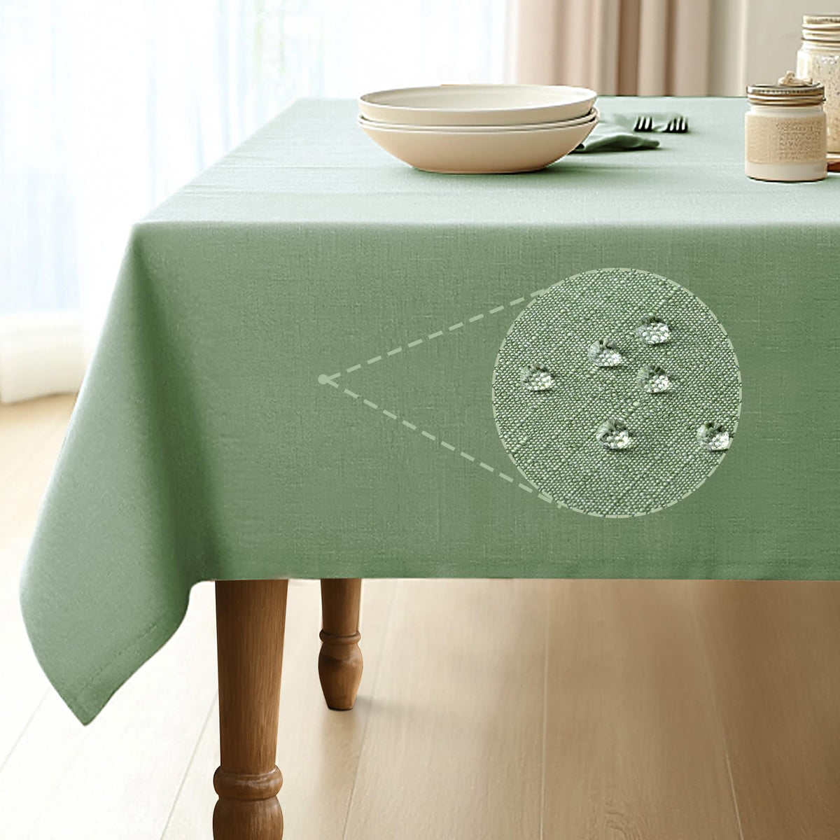 Pureegg rectangle tablecloth in sage green with water-repellent fabric for spill protection.