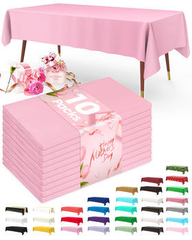 Pureegg pink 54x108 tablecloth draped over a table for festive coverage