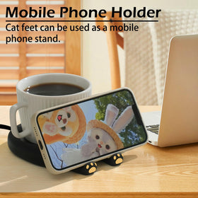 PUSEE Warmer's non-slip feet keep it steady on a desk.