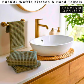 Close-up on PÜSKÜL waffle towel texture and honeycomb weave.