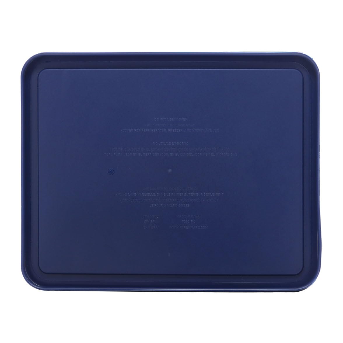 Pyrex 7212-PC lid on dish demonstrates microwave-safe and freezer-ready storage.