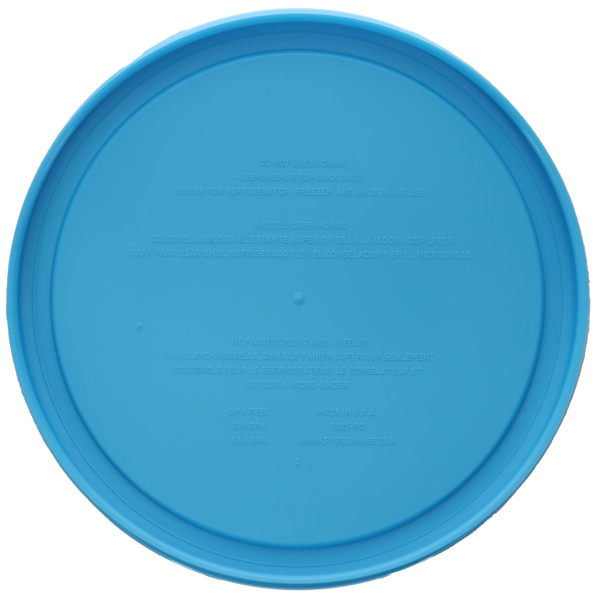 Pyrex 7402-PC bright blue lid top view highlights top-rack dishwasher-safe care.