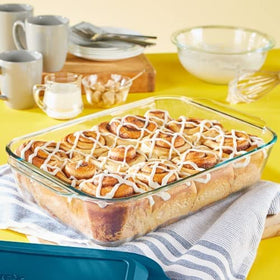 Pyrex deep-9x13 dish shown stacked for space-saving storage.