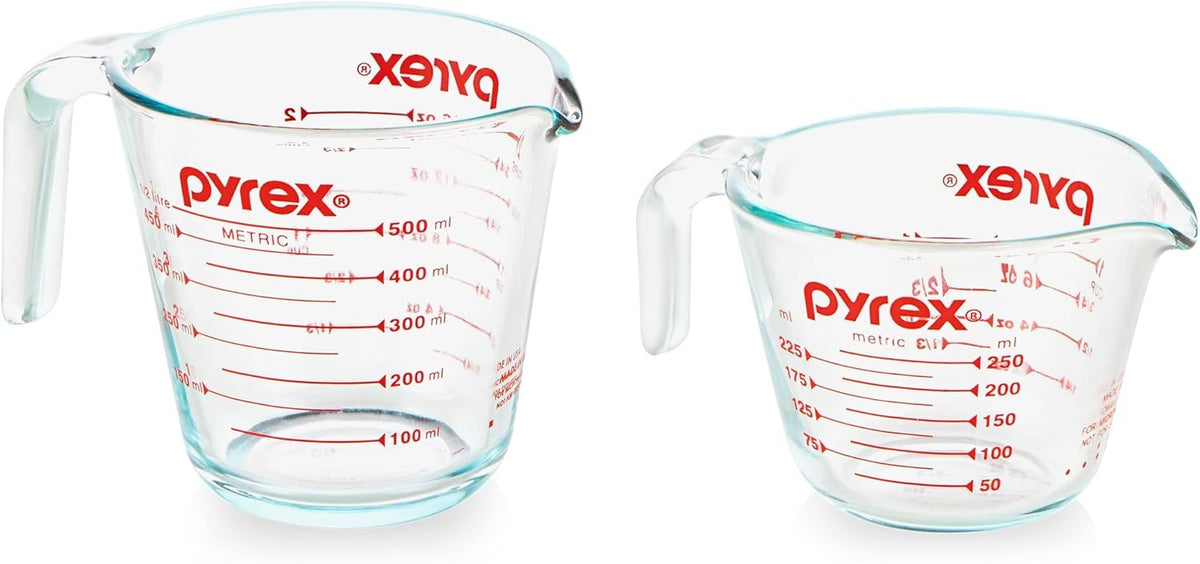 Pyrex Essentials 2-pack measuring cups with clear red markings for precise baking.