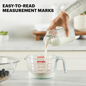 Pyrex Essentials 2-cup measuring cup with bold red markings for quick reading.