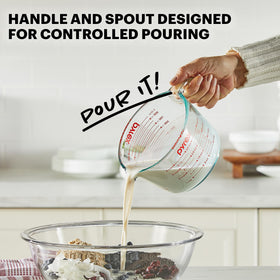 Pour spout design on Pyrex measuring cup for controlled pouring.