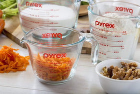 Durable tempered glass construction of Pyrex Essentials measuring cups.