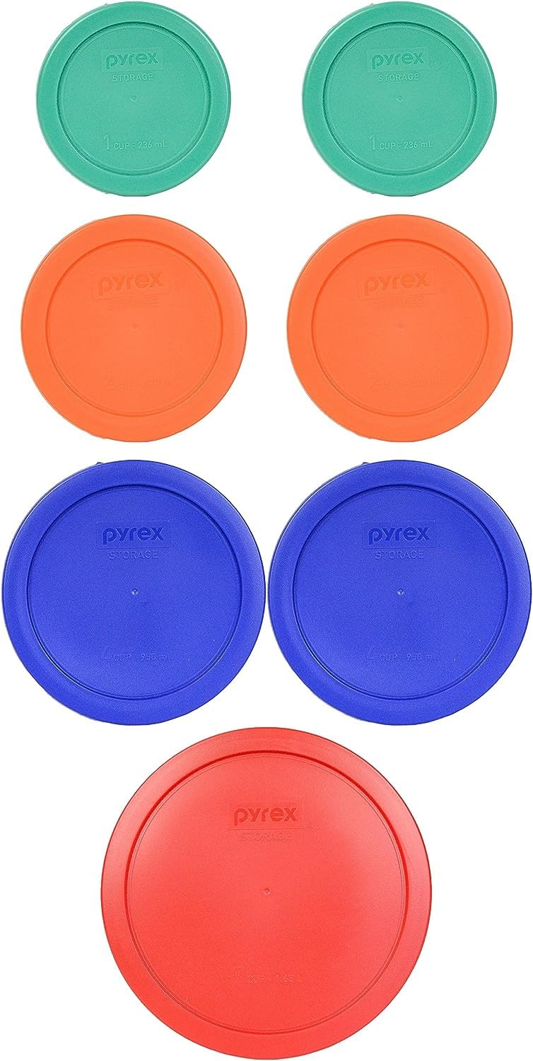 Pyrex orange 2-cup lid ideal for organized fridge storage.