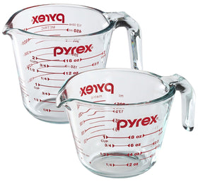 Pyrex Prepware 1-Cup measuring cup with red markers, durable glass for accurate measuring.