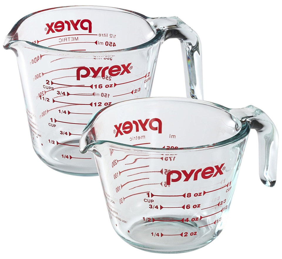 Pyrex Prepware 1-Cup measuring cup with red markers, durable glass for accurate measuring.