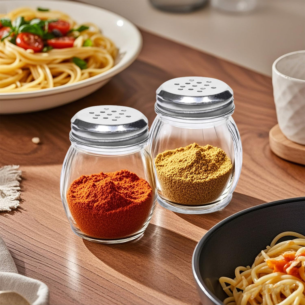 PYVYLO shaker featuring stainless steel mesh top for consistent seasoning.