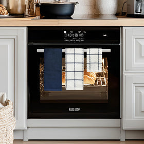 QAJ kitchen towels organized for pantry storage and easy reach.