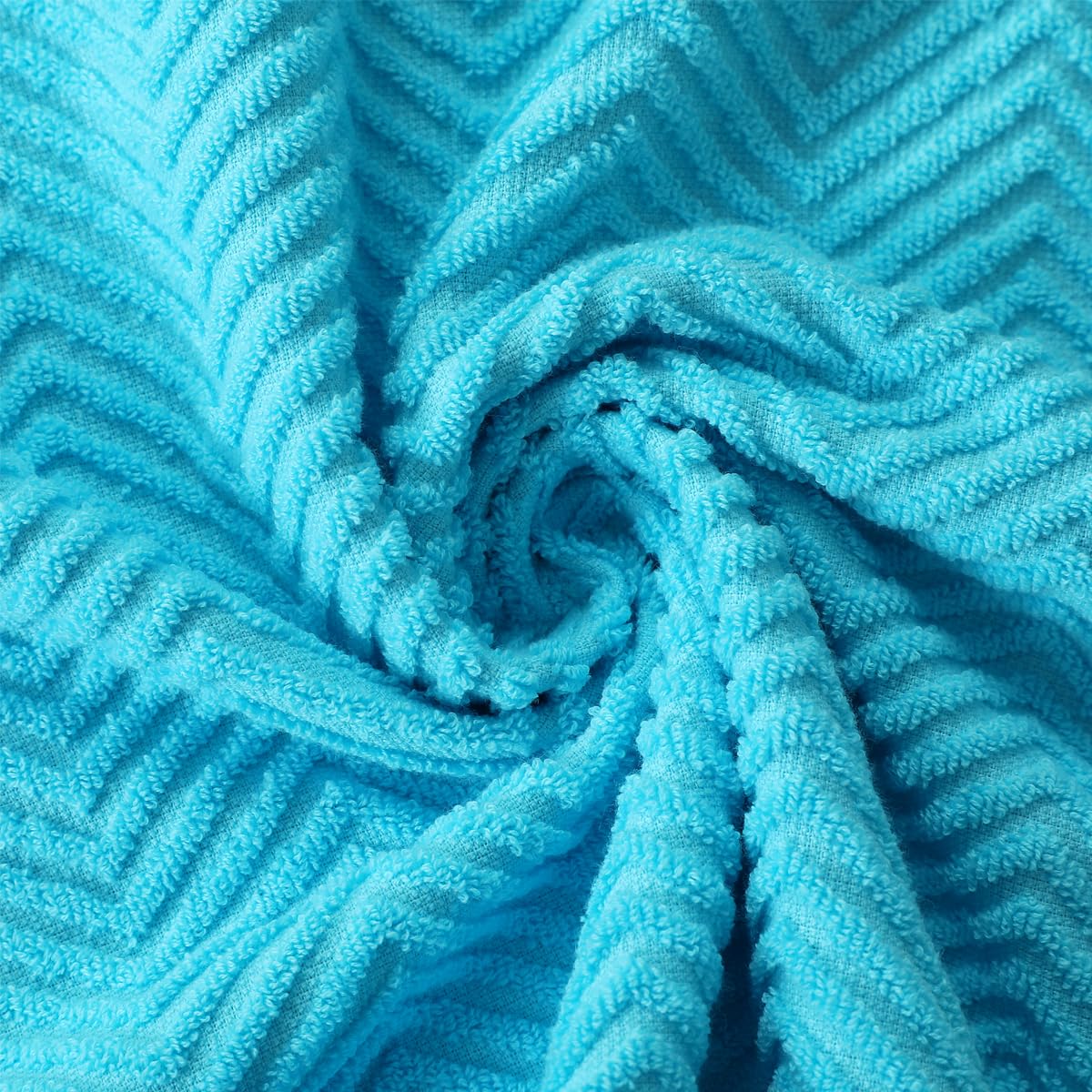 QAJ wave-pattern towels demonstrate enhanced absorption during spills.