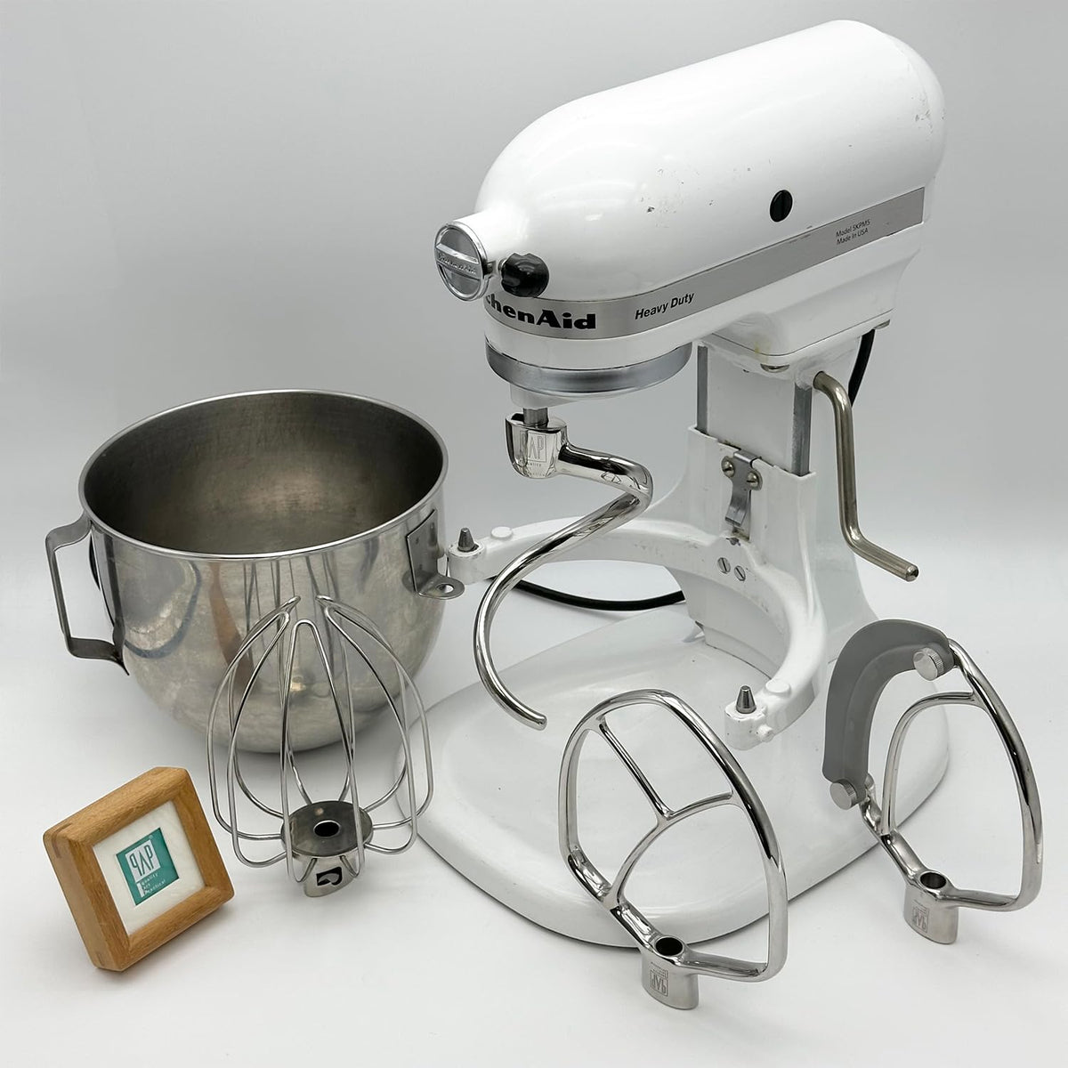 QAp Quality Art Practical dishwasher-safe hook for easy cleanup.