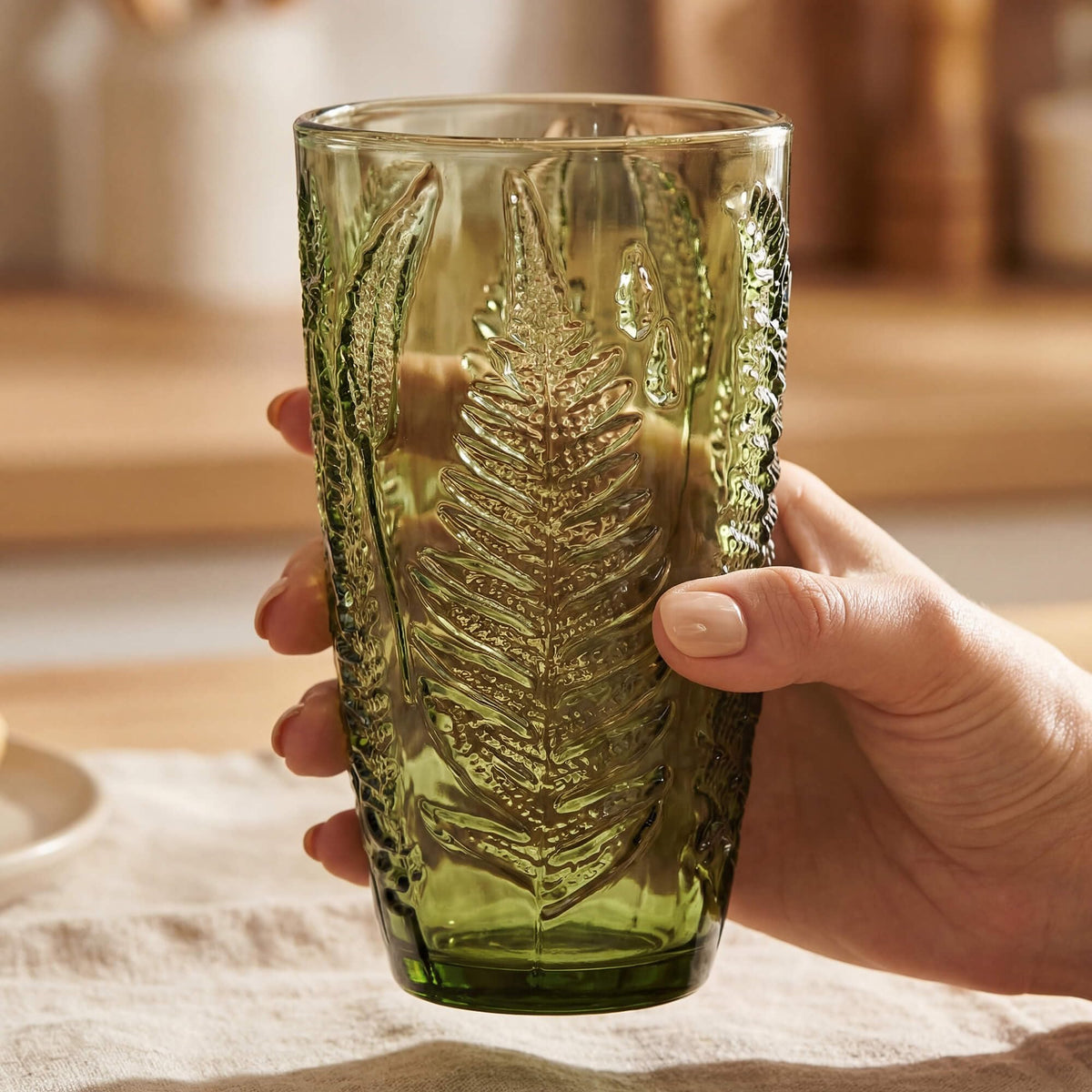 QELVIO vintage green glasses arranged on a table for everyday elegance.