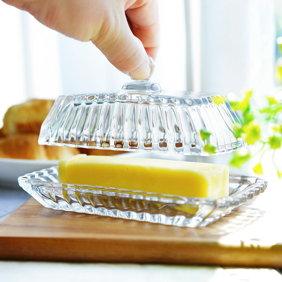QFkris butter dish fits standard sticks for convenient serving.