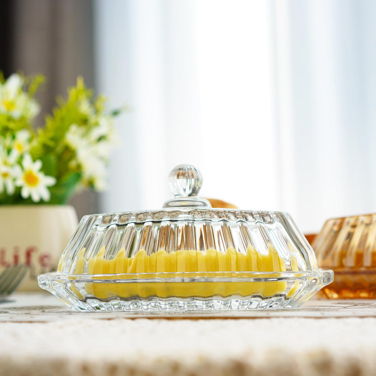 QFkris butter dish keeps kitchen organized and ready for spreads.