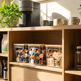 Qilinba natural bamboo lids adding warmth and dust protection to pods.