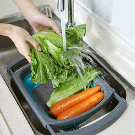QiMH Colander large capacity for serving sizable portions of pasta and greens.