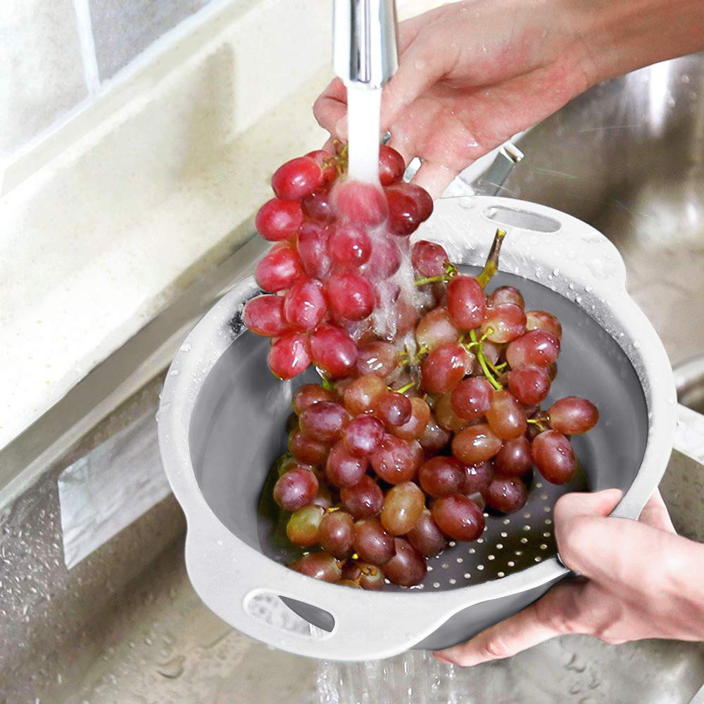 QiMH colander with ergonomic handles for comfortable draining.