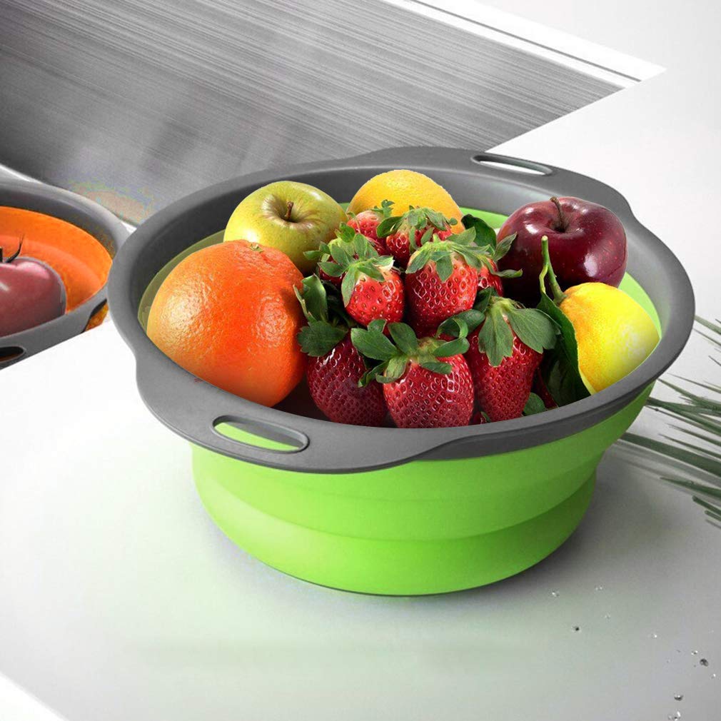QiMH collapsible colander during pasta drain demonstrates versatile kitchen use.