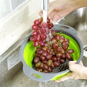 QiMH collapsible colander rinsing vegetables for quick cleanup.