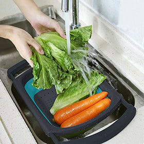 QiMH silicone colander with non-slip handles offering stable draining