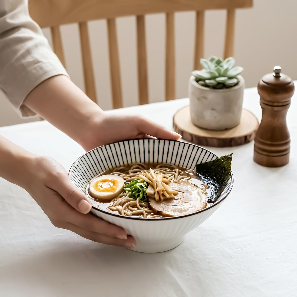 QINLANG set of 4 bowls complements existing dinnerware for versatile table setup