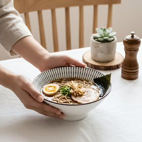 QINLANG set of 4 bowls complements existing dinnerware for versatile table setup