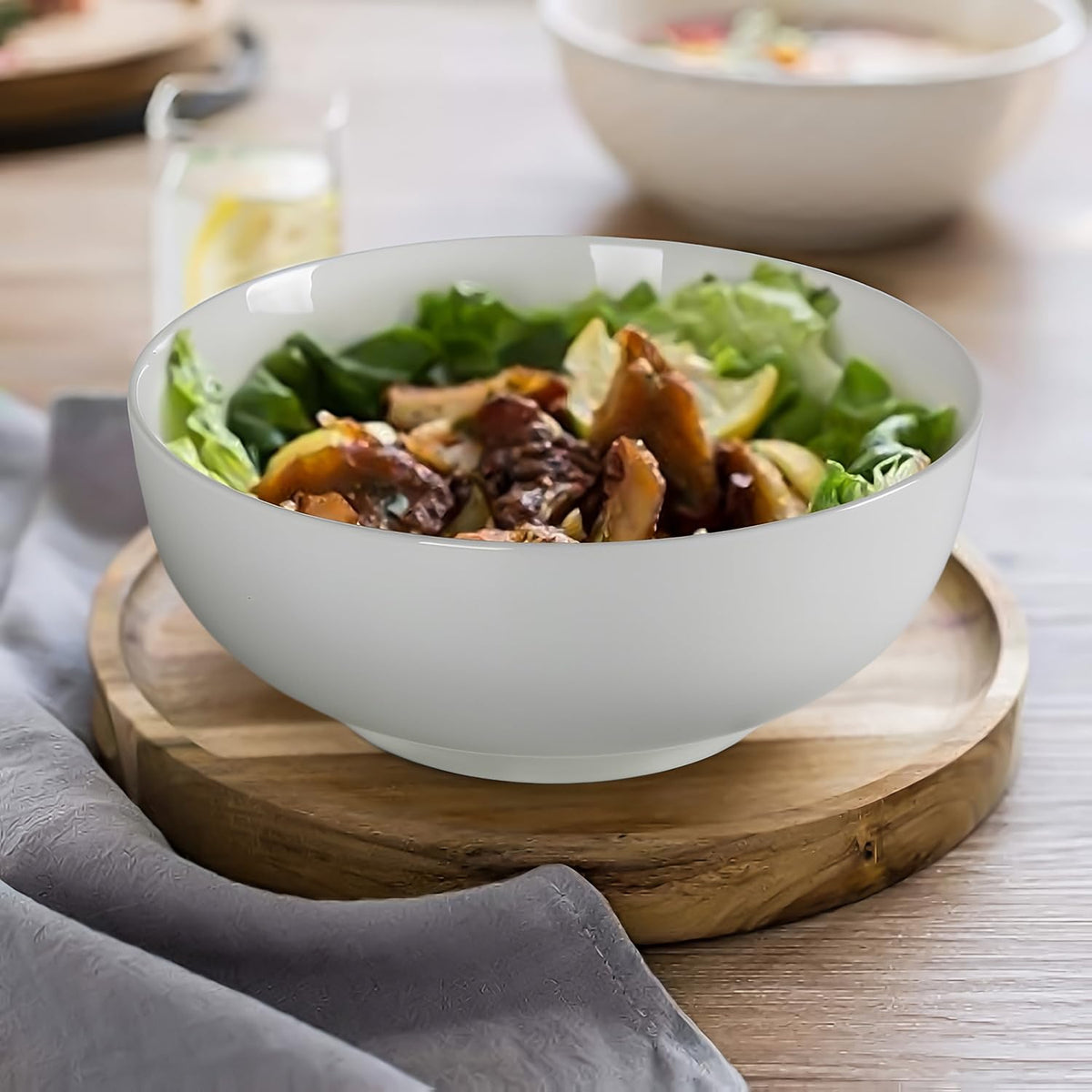 QINLANG set of 3 porcelain bowls for versatile table setting.