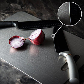 QINOSHMO titanium cutting board compact design fits small kitchens and storage.