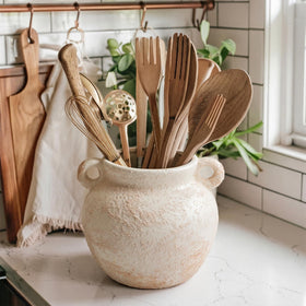 Qinyoung ceramic utensil holder wide opening for easy insertion and removal of tools.